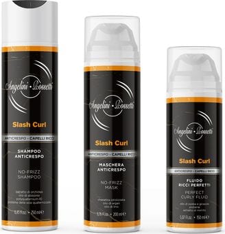 I flaconi neri con le fasce arancio della linea Slash Curl